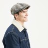 Newsboy cap with herringbone and line pattern fabric