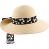 Large brim hat raised at the back in paper braid with flower pattern s