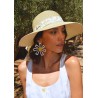 Large brim hat raised at the back in paper braid with flower pattern s