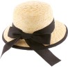 Women's straw cap with ribbon and plain bound edge.