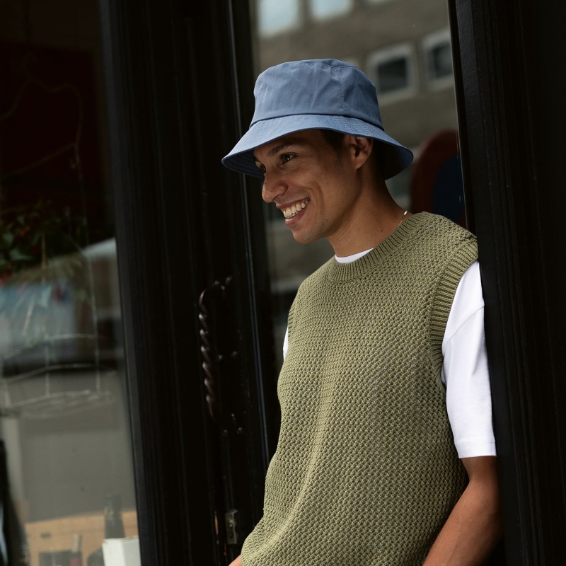 Plain color waterproof bucket hat.