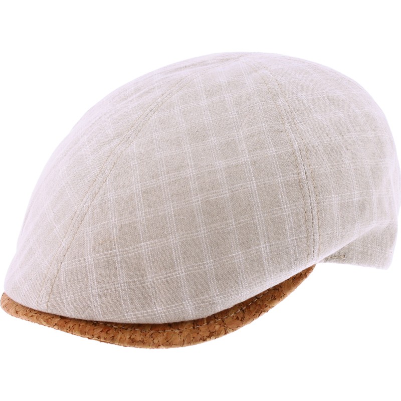 Flat cap in patterned fabric with cork visor.