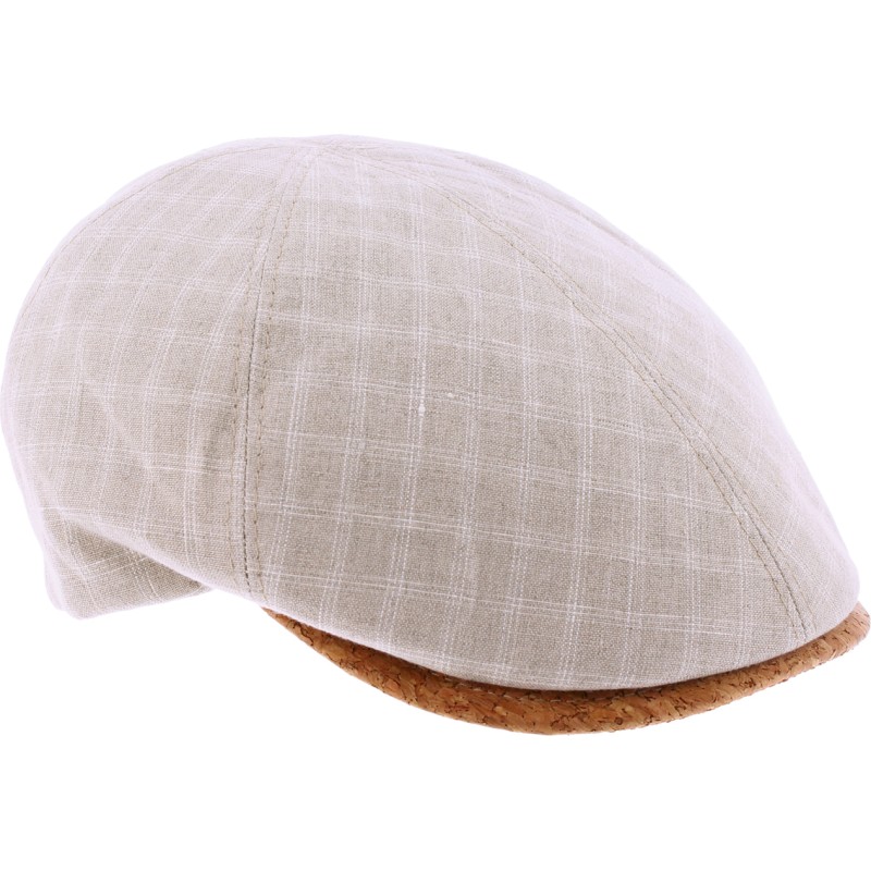 Flat cap in patterned fabric with cork visor.