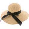 Large straw brim hat, with plain ribbon and interior drawstring.