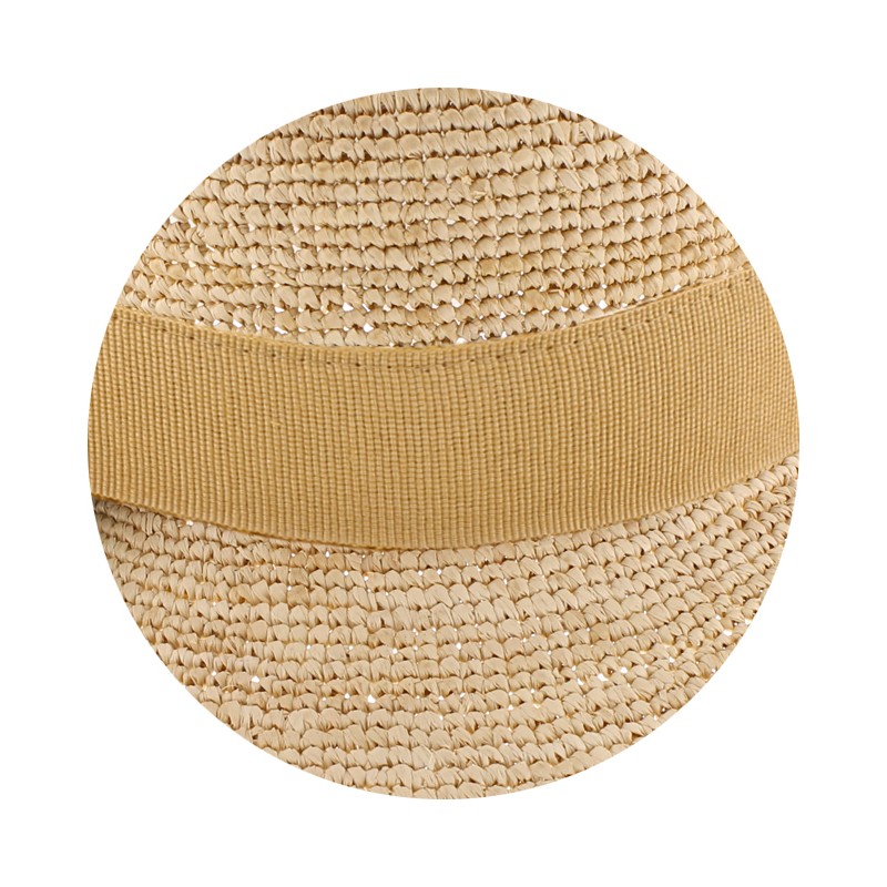 Large straw brim hat, with plain ribbon and interior drawstring.