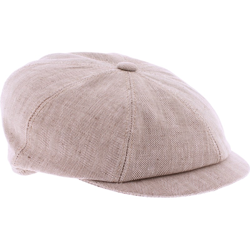 Newsboy cap in fabric with herringbone pattern.