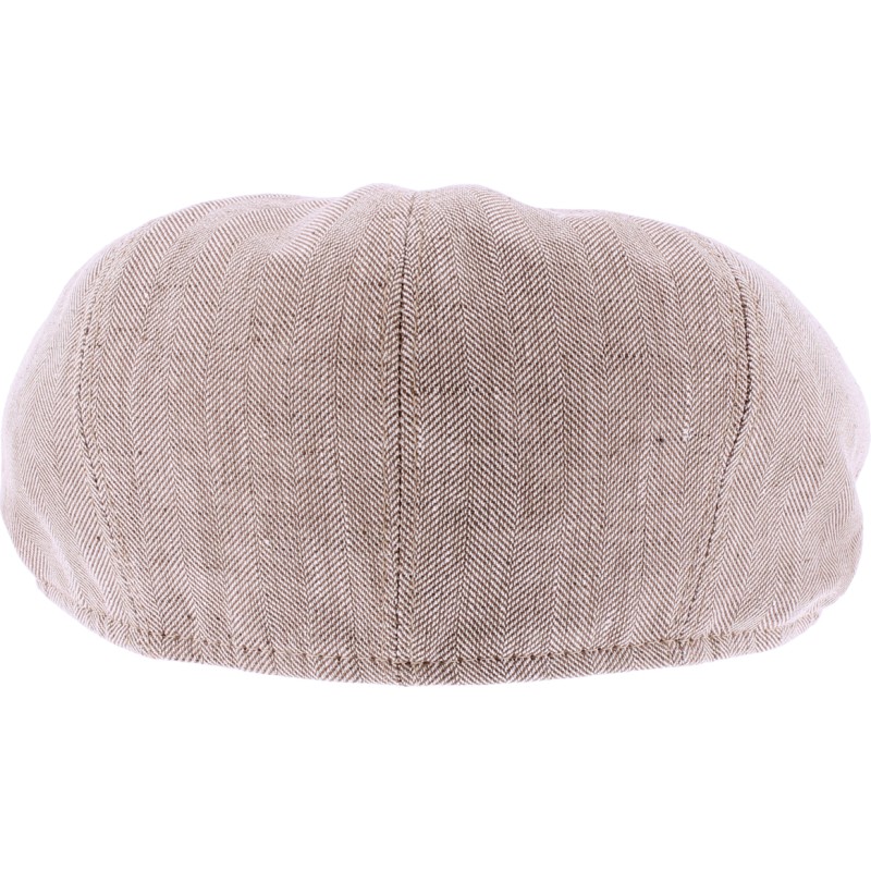 Newsboy cap in fabric with herringbone pattern.