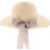 Large brim hat raised at the back in paper braid with flower pattern s