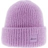 Plain chunky knit children's hat with badge and cuff
